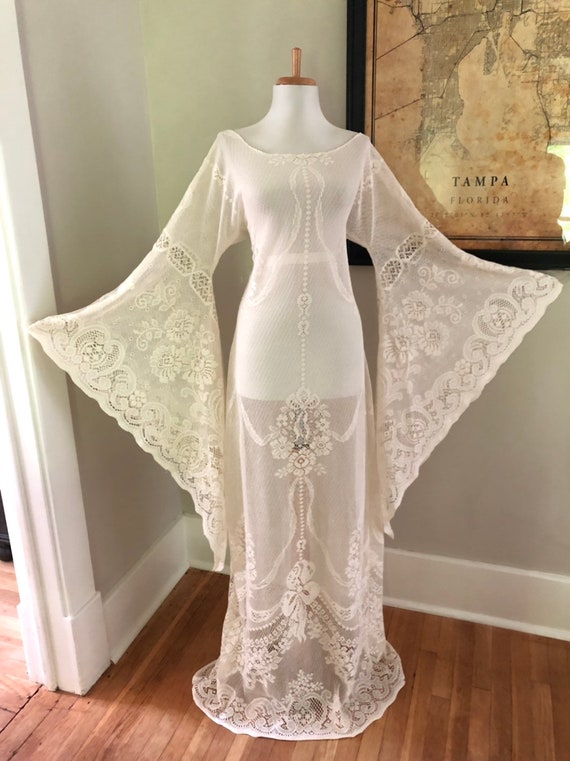 White Flare Sleeve Sheer Lace Maxi Dress White Flare Sleeve Sheer Lace Maxi Dress