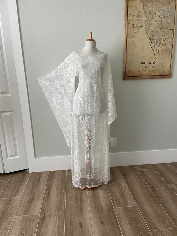 White Flare Sleeve Sheer Lace Maxi Dress White Flare Sleeve Sheer Lace Maxi Dress