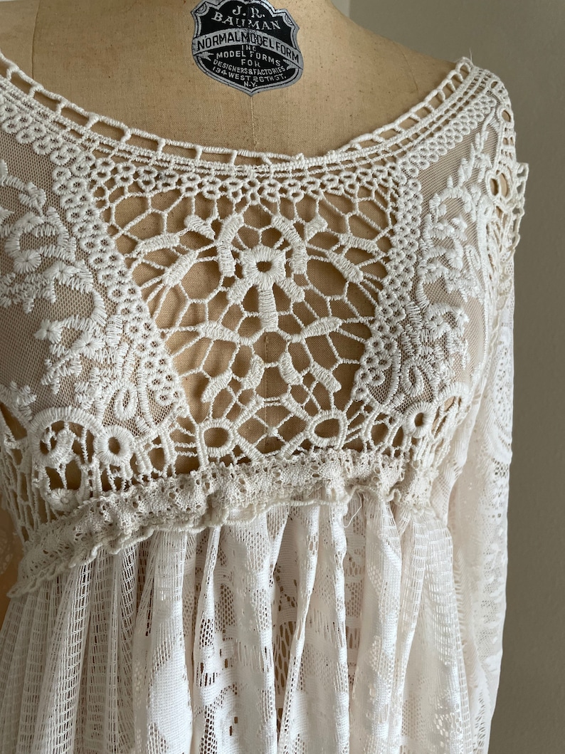close-up view of the crochet bodies on an Empire waste lace Bohemian wedding gown sold on Etsy