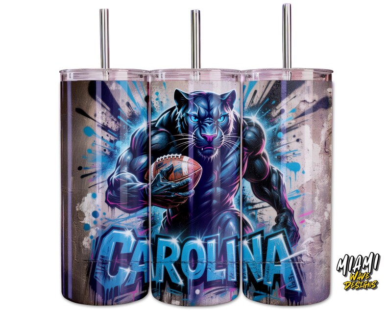 May include: Three stainless steel tumblers with a wraparound design. The design features a muscular black panther holding a football, with the word "CAROLINA" in blue graffiti-style lettering. The background has a distressed, urban art aesthetic.
