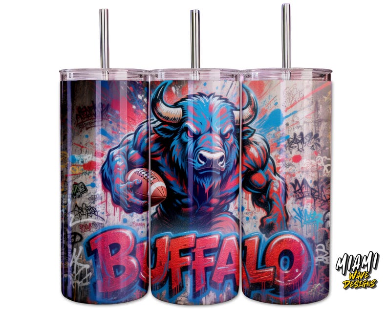 May include: Three stainless steel tumblers with a striking design. A muscular blue buffalo holding a football is set against a graffiti-style background. The word "BUFFALO" is in red. Each tumbler has a silver straw.