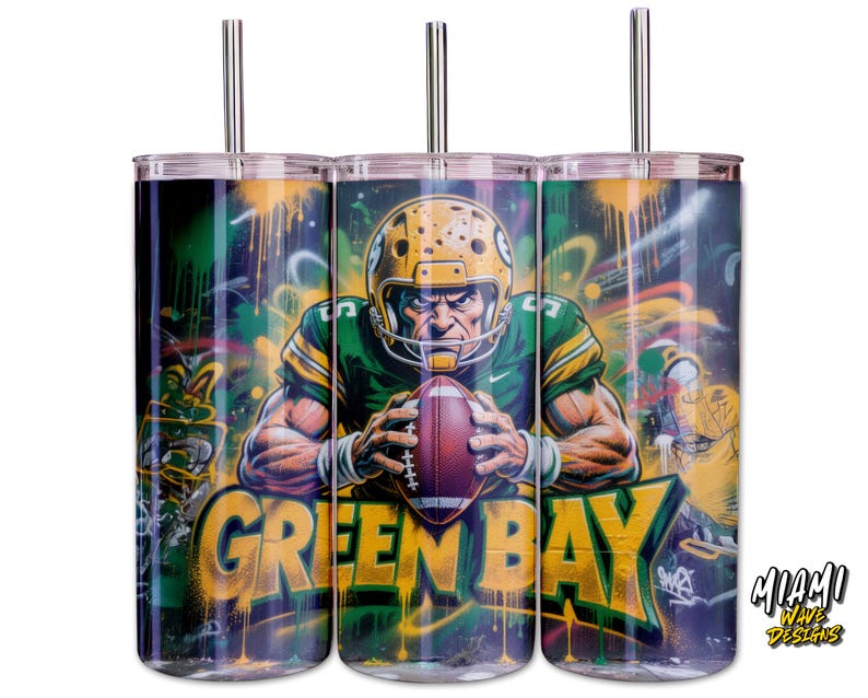 May include: Three stainless steel tumblers with a Green Bay Packers theme. Each tumbler features a football player graphic in a green and gold uniform, holding a football, set against a graffiti-style background. The words "GREEN BAY" are prominently displayed.