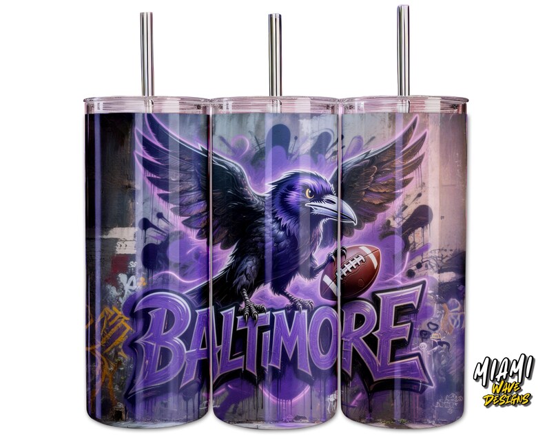 May include: Three stainless steel tumblers with a purple and black design. The design features a raven holding a football, with the word "BALTIMORE" in graffiti style. The tumblers have silver straws.