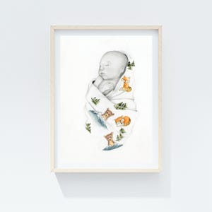 May include: A framed watercolor print of a sleeping baby wrapped in a white blanket. The blanket is decorated with illustrations of foxes, bears, and evergreen trees. The artwork is set against a white background.