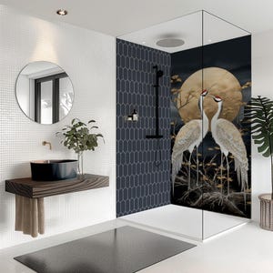 May include: A modern bathroom with a walk-in shower featuring a crane mural. The shower has a black showerhead and a dark blue tile wall. A round mirror and a wooden vanity with a black sink complete the space.