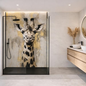 May include: A shower enclosure with a black frame and a large giraffe portrait on the back wall. The giraffe has a spotted pattern and is set against a gold and gray background. The bathroom has a modern design.