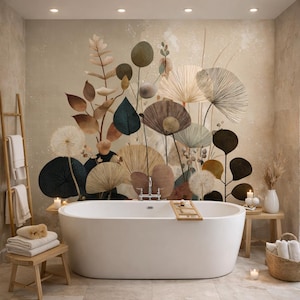 May include: A modern bathroom with a white oval bathtub. The wall features a large floral mural in shades of brown, green, and beige. A wooden ladder with towels, a small wooden stool with towels, and candles add to the spa-like ambiance.