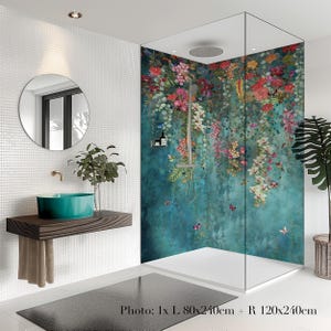 May include: A modern bathroom with a teal sink, a wooden vanity, and a shower with a floral mural. The shower features a glass enclosure and a white base. The mural has a teal background with colorful flowers and butterflies.