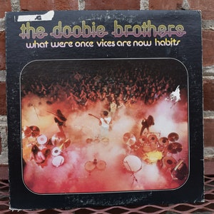 Doobie Brothers;  What were once vices are now habits , 1974 vintage vinyl Lp, classic rock vintage record
