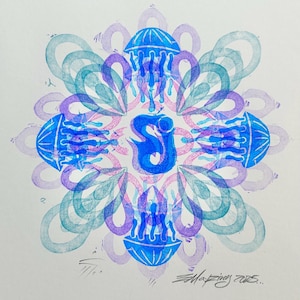 May include: A blue, purple, and teal mandala print featuring jellyfish and abstract shapes. The artwork has a central blue shape and four jellyfish around it. The print is signed and numbered.