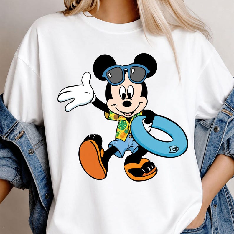 May include: A white t-shirt featuring a graphic of Mickey Mouse wearing blue sunglasses, a yellow shirt with a green pineapple and leaf pattern, and blue shorts. Mickey is holding a light blue inflatable swim ring and wearing orange sandals.