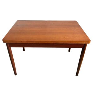 Mesa de comedor extensible de teca, diseño danés vintage de mediados de siglo (años 60).