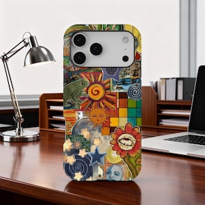 May include: A vibrant phone case with a collage design. The artwork includes a green frog, a sun with radiating rays, stars, and a flower with a face. The case has a glossy finish and is designed to fit a smartphone.