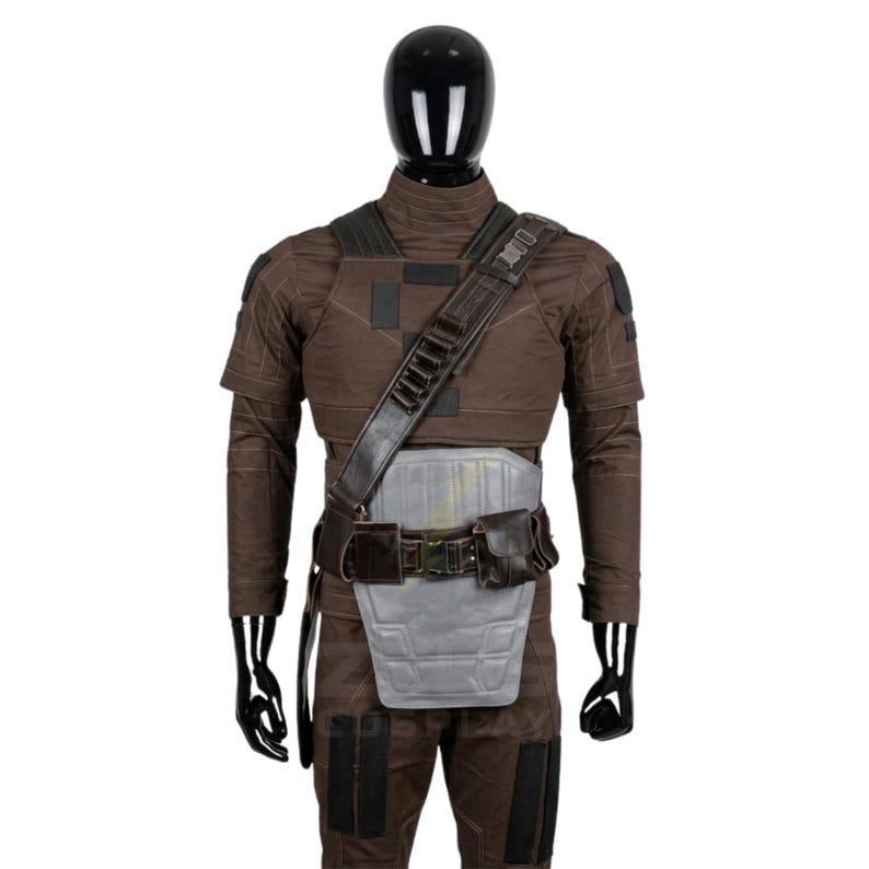 May include: A brown tactical costume set featuring a high-neck long-sleeve top and matching trousers with black rectangular patches. It includes a grey chest and abdominal armor plate, a dark brown utility belt with a pouch, and a shoulder strap.