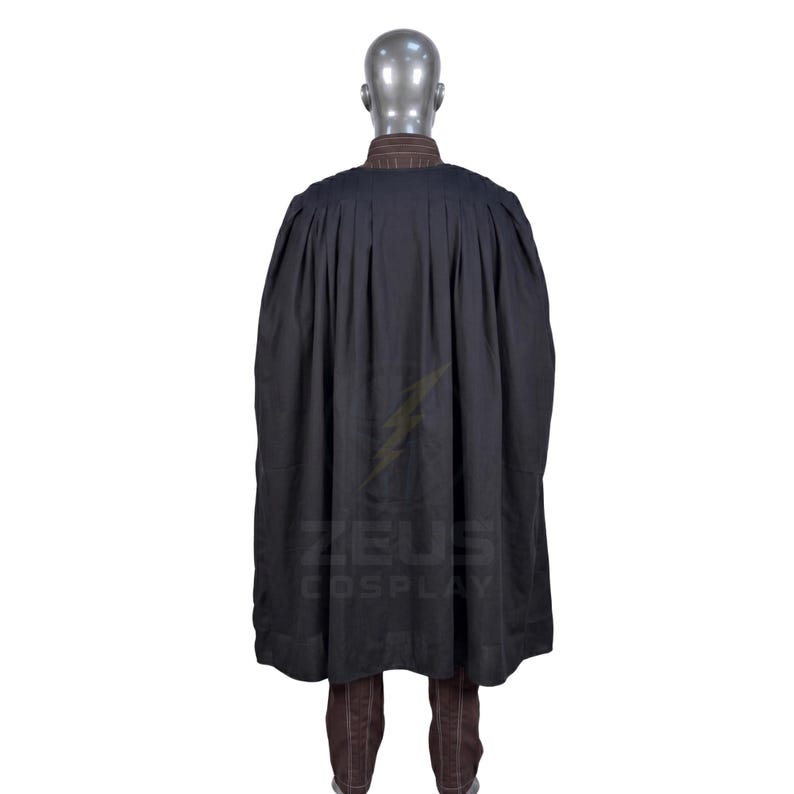 May include: A black cape with pleats, worn over a brown collared shirt and brown pinstripe pants. The costume is displayed on a mannequin. The Zeus Cosplay logo is visible on the right side.
