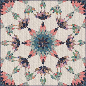 May include: A quilted textile featuring a central starburst design in shades of teal, pink, and navy blue. The star is surrounded by geometric shapes with floral patterns and white quilted sections. The quilt has a navy blue border.