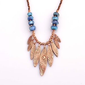 FRISKEY handmade Lampwork Glass Beads and Jewelry, Copper Tribal Feather Necklace