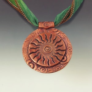 FRISKEY handmade Lampwork Glass Beads & Jewelry, Copper Sun pendant necklace