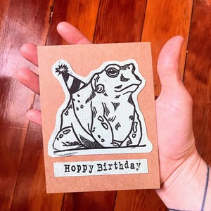 Cartão de aniversário Hoppy em branco
