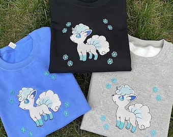 Alolan Ice Fox Inspired Embroidered T-Shirt, Cute Snow Fox Poke Style Embroidery Crewneck, Winter Anime Hoodie Gift, Poke Lovers Tee
