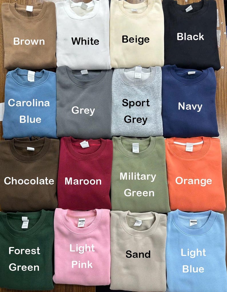 May include: A set of three ceramic mugs with a speckled, matte finish. The mugs are in shades of cream, light gray, and dark gray. Each mug has a simple, minimalist design, perfect for coffee or tea.