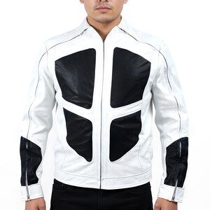 May include: A white leather jacket with black panels on the chest and sleeves. The jacket has a zip-up front and a stand-up collar. The design features contrasting black and white sections, creating a modern, sporty look.