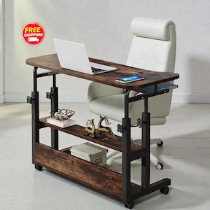 May include: A brown and black adjustable laptop desk with two shelves. A laptop and smartphone sit on the desk. The desk has a metal frame and is on wheels. Decorative items are on the shelves.