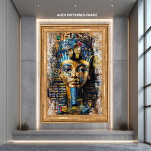May include: A framed painting featuring an Egyptian pharaoh, with the text "AGED PATTERNED FRAME" at the top. The pharaoh's face is rendered in gold, blue, and brown hues. The artwork is displayed in a modern interior.