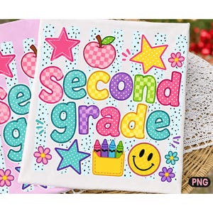 May include: A white fabric square featuring the text Second grade in colorful, patterned bubble letters. The design includes a pink checkered apple, yellow and pink stars, a yellow smiley face, a yellow crayon box, and small flowers.