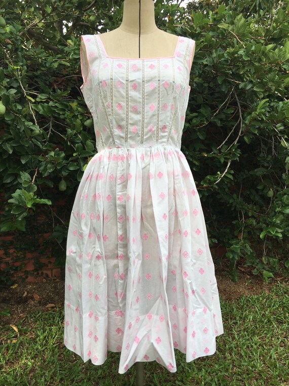 pink swing dress 1950s