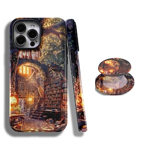 May include: A phone case and a pop socket featuring a detailed illustration of a library with bookshelves, stairs, and warm lighting. The design includes a tree and a whimsical, fantasy-inspired aesthetic.