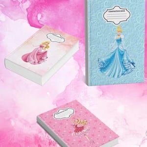 May include: Three composition notebooks with princess-themed covers. One notebook features a pink cover with a princess in a pink dress, another has a blue cover with a princess in a blue dress, and the third has a pink cover with a ballerina.