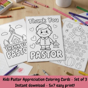May include: Three white coloring cards with black outlines and the words "Thank You Pastor" and "Thankful for my Pastor". The cards feature images of a church, a cartoon boy, and a turkey. Crayons and colored pencils surround the cards.