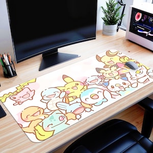 A colorful and whimsical mouse pad featuring various cartoon characters from the Pokémon franchise, including Pikachu, Charizard, and other popular Pokémon figures.