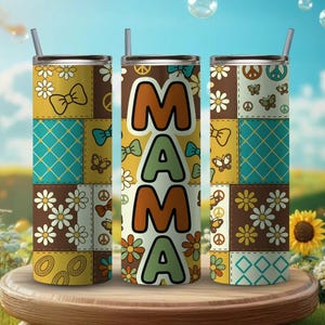 May include: Three stainless steel insulated tumblers with lids and straws. The tumblers feature a patchwork design with daisies, bows, peace signs, and the word "MAMA" in large letters. The color scheme includes brown, yellow, teal, and orange.