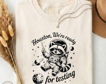 Houston We’re Ready For Testing Shirt, Funny Teacher Test Day Tee, Comfort Colors School Testing T-shirt, Teacher Racoon Astronaut Sweater