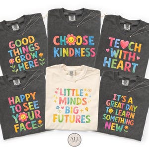 a collection of six t-shirts, each with a different colorful and uplifting message printed on them.
