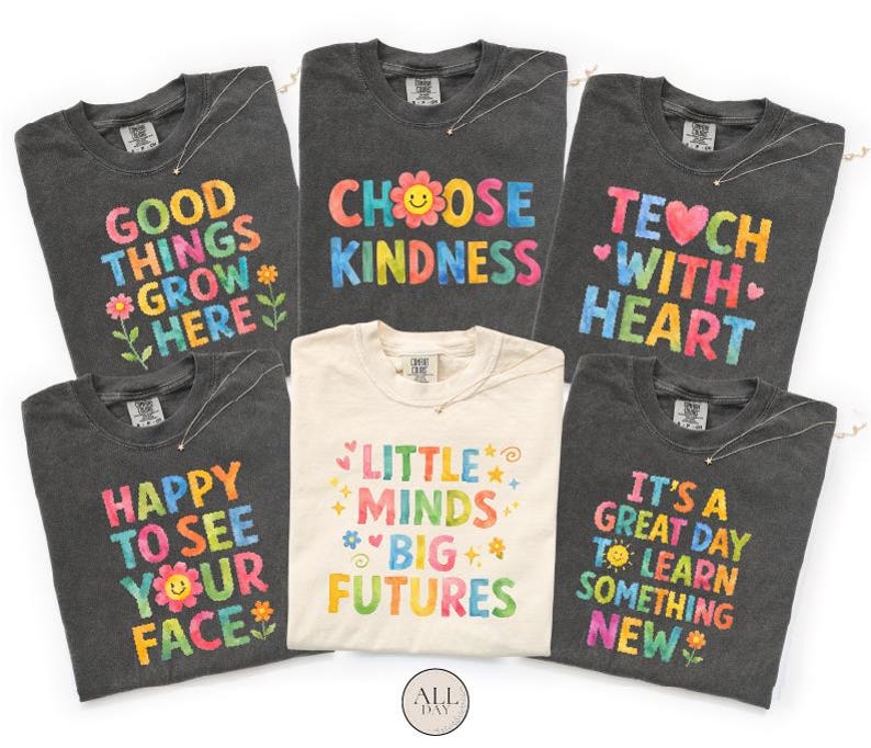 a collection of six t-shirts, each with a different colorful and uplifting message printed on them.