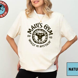 a woman wearing a white shirt with a monkey on it