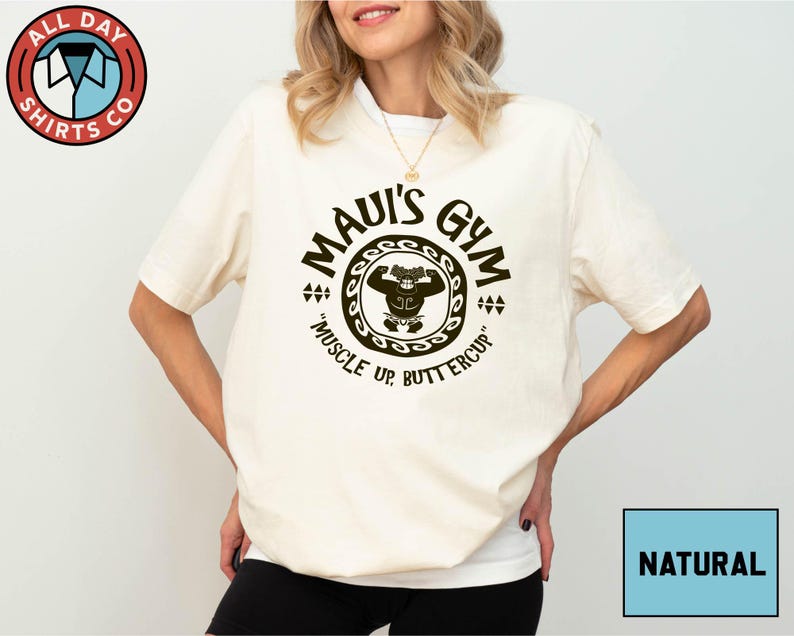 a woman wearing a white shirt with a monkey on it
