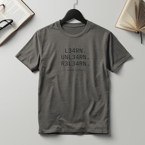 Learn. Unlearn. Relearn. T-shirt | A clean, coded message about learning and adaptability, written in leet speak.