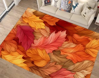 May include: A rectangular area rug featuring a vibrant autumn leaf design. The rug showcases a mix of warm colors, including shades of red, orange, and yellow, creating a cozy and inviting atmosphere. The detailed leaf pattern adds a touch of nature-inspired decor to any living space.