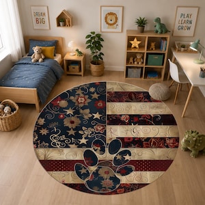 May include: A round area rug featuring a stylized American flag design with a large central paw print. The pattern incorporates navy blue, red, and cream sections decorated with floral motifs, stars, and swirling lines across the entire surface.