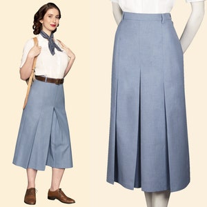 May include: A light blue pleated skirt with a high waist and a knee-length hem.