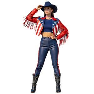 May include: A red leather jacket with fringe and a patriotic design featuring white stripes and stars, paired with a navy blue crop top, navy blue pants with red side stripes, a navy blue cowboy hat, and black cowboy boots.