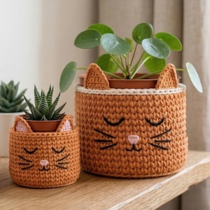 May include: A set of three ceramic mugs with a speckled, matte finish. The mugs are in shades of cream, light gray, and dark gray. Each mug has a simple, minimalist design and a rounded handle.