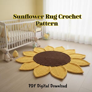 May include: A crocheted sunflower rug with a brown center and yellow petals. The rug is on a light-colored wooden floor. Text on the image reads "Sunflower Rug Crochet Pattern" and "PDF Digital Download". A crib and stuffed animals are in the background.