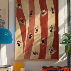 May include: A framed vertical wall art print featuring a repeating pattern of vertical red and cream stripes with small illustrations of skiers in various colorful outfits and hats skiing down the slopes across the entire composition.