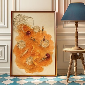 May include: A framed art print depicting a spilled orange cocktail with ice cubes, two red cherries, and a long orange peel. Several tiny figures are swimming or lounging in the spilled liquid, which spreads across the off-white background.