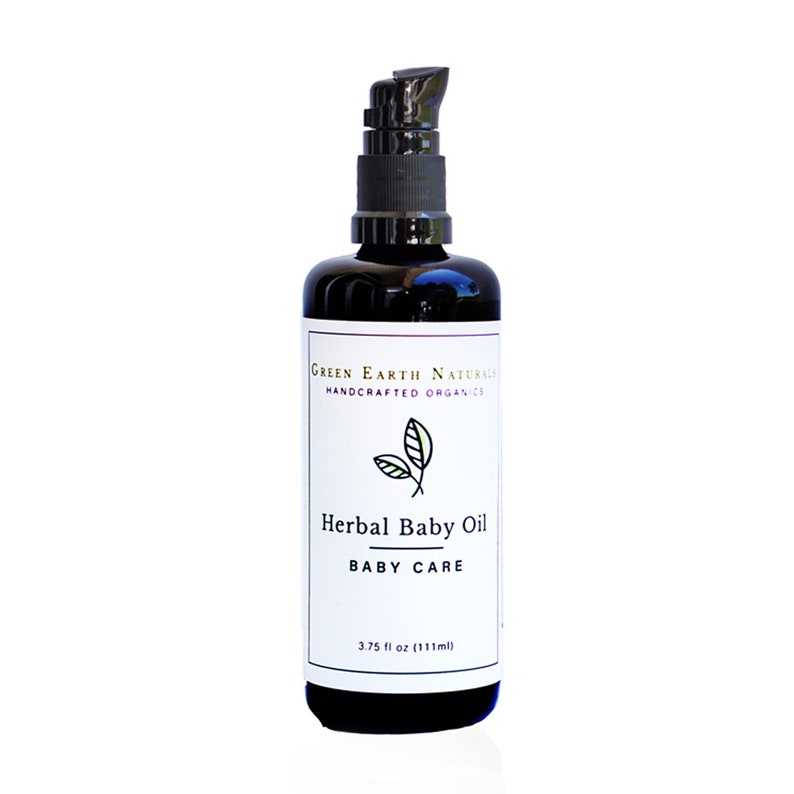 May include: A dark glass bottle of Herbal Baby Oil with a black pump dispenser. The label reads "Green Earth Naturals, Handcrafted Organics" and "Herbal Baby Oil, Baby Care." The bottle contains 3.75 fl oz (111ml) of oil.